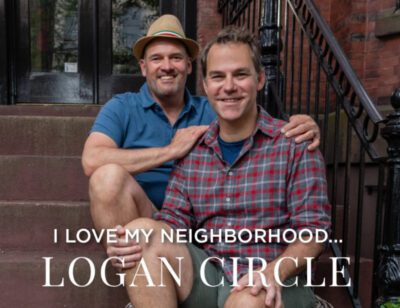 Two men sitting on the stairs - Logan Circle